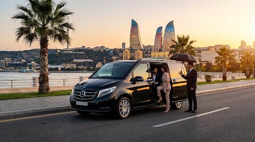 AirTransfer chauffeur assisting a passenger in Baku